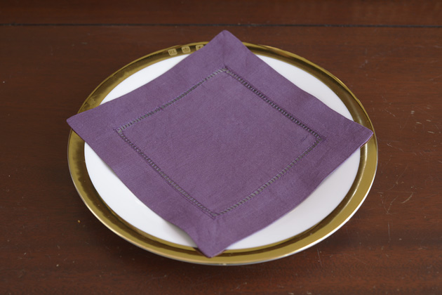 Solid colored hemstitch cocktail napkin 6". Spiced Plum color